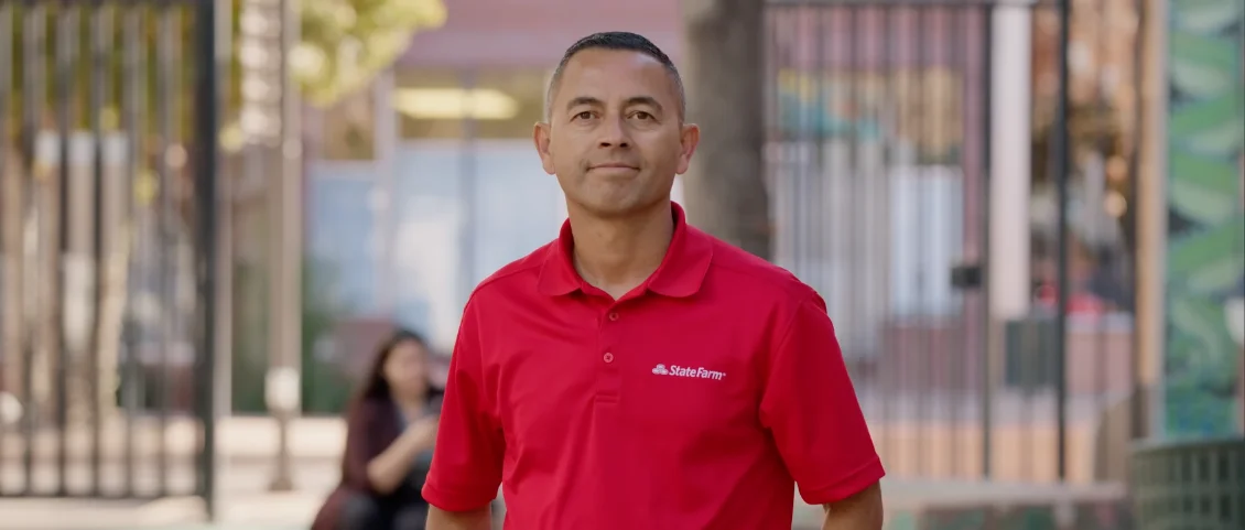 Documentary still of a State Farm agent, candid portrait.